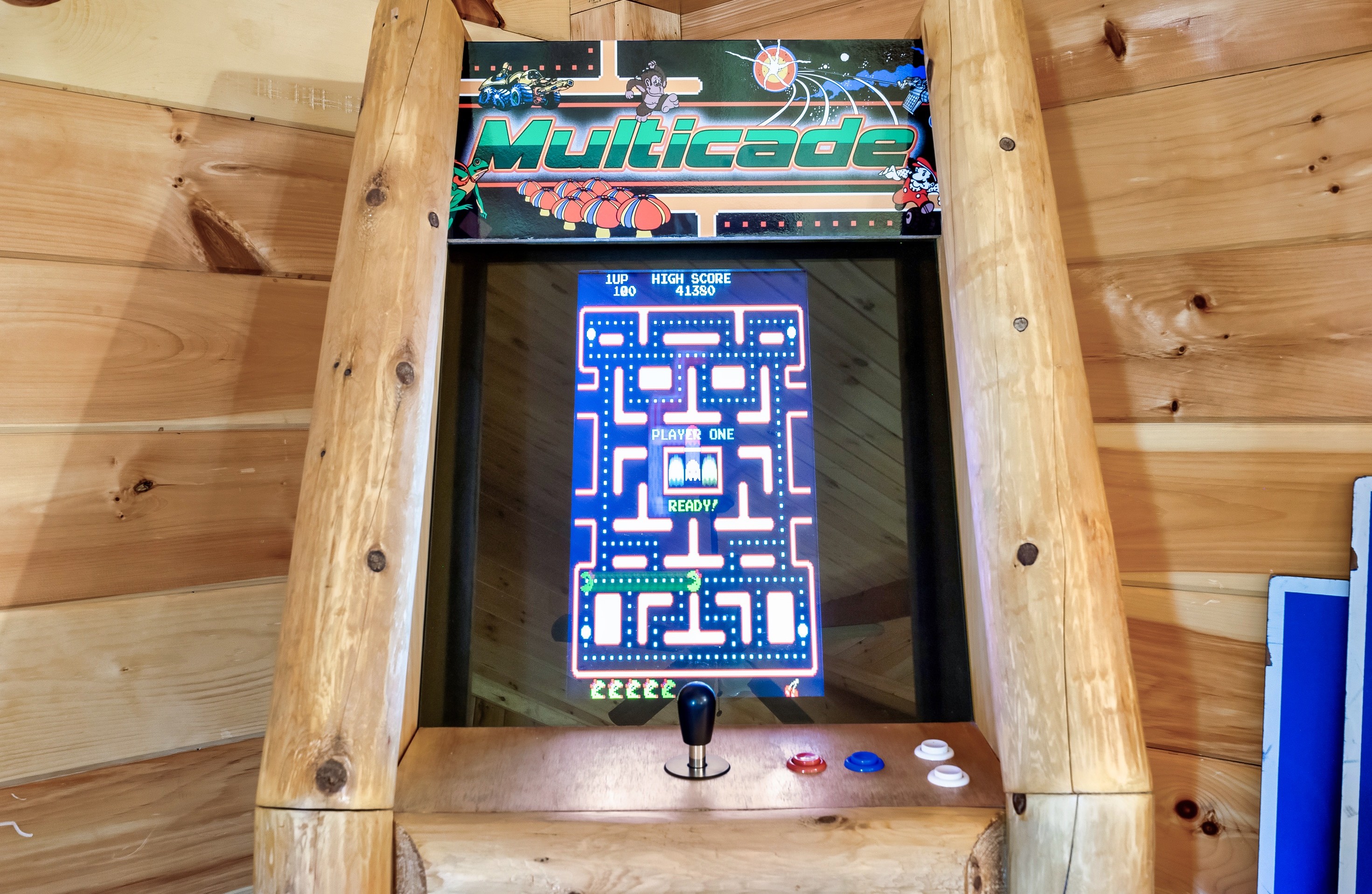 Arcade game room with multicade machine