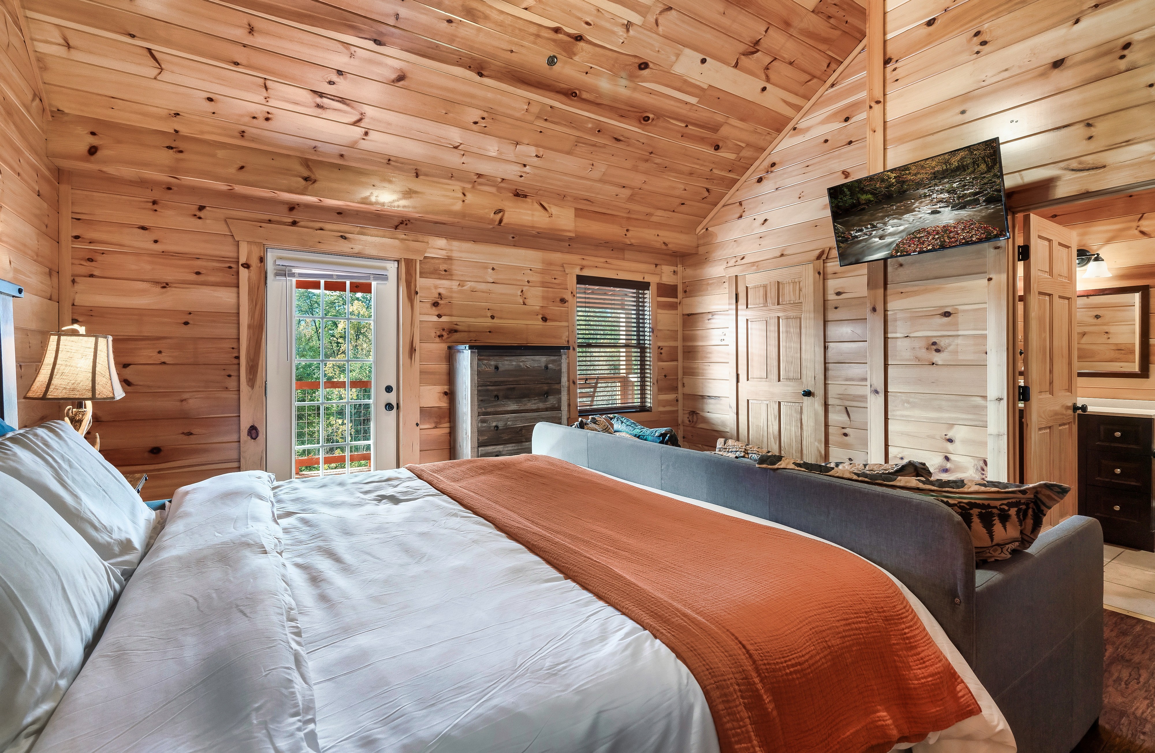 King bedroom suite with rustic wood interior