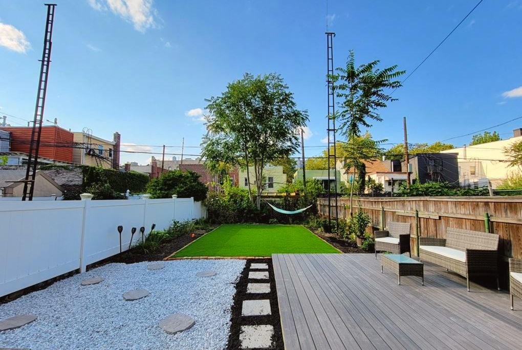 Brick townhouse on tree-lined street in Williamsburg