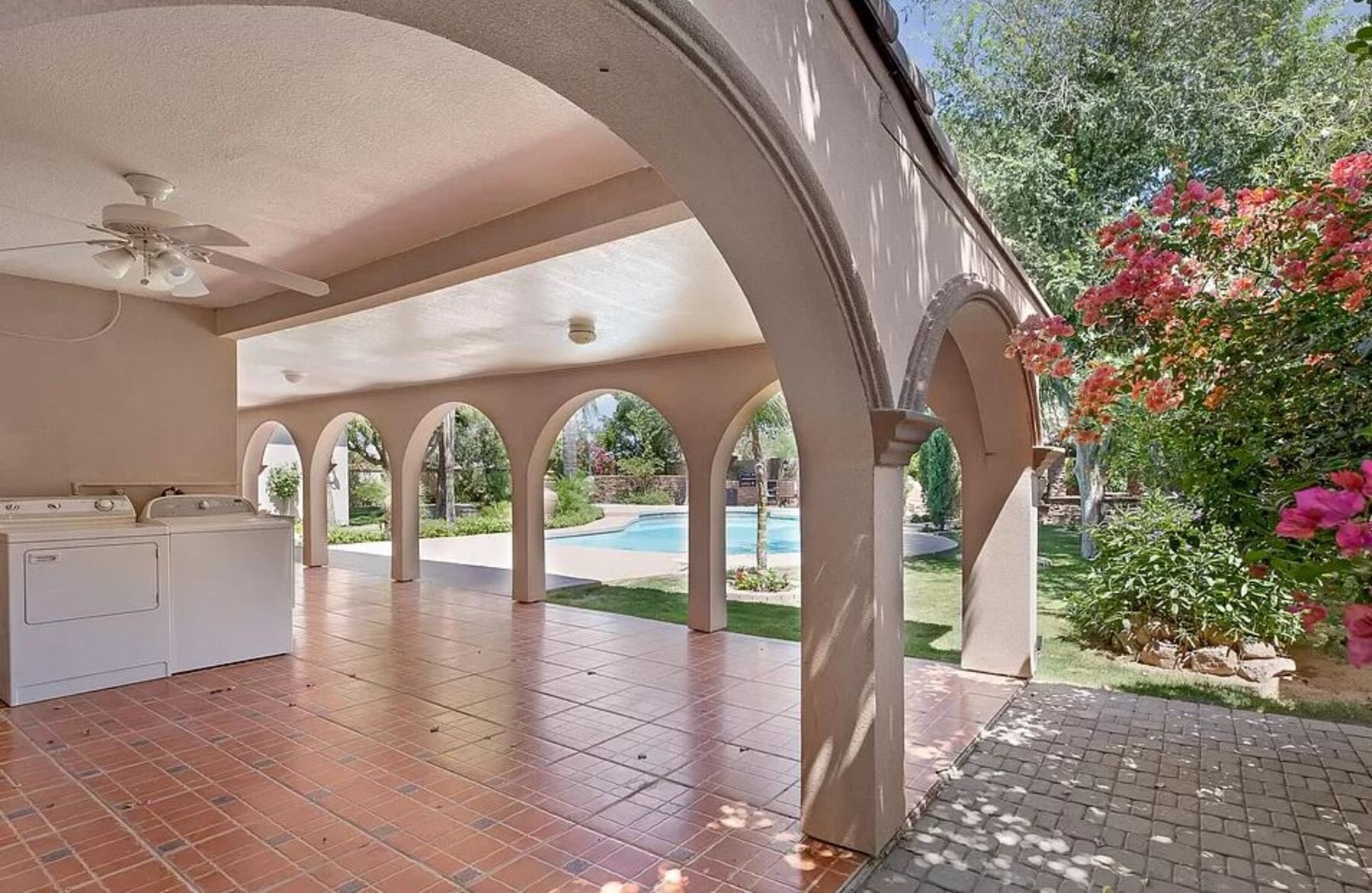 Covered patio with arched columns