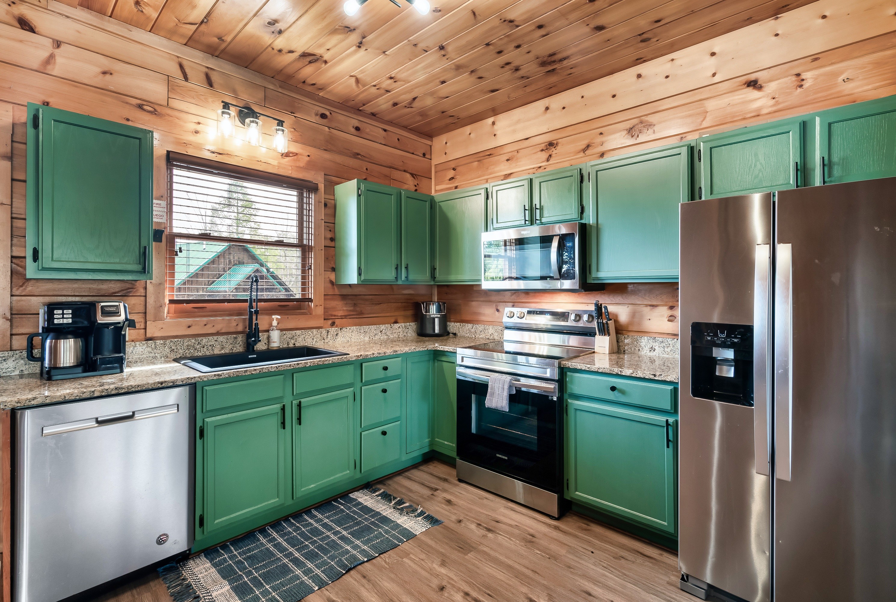 Fully stocked kitchen with granite countertops