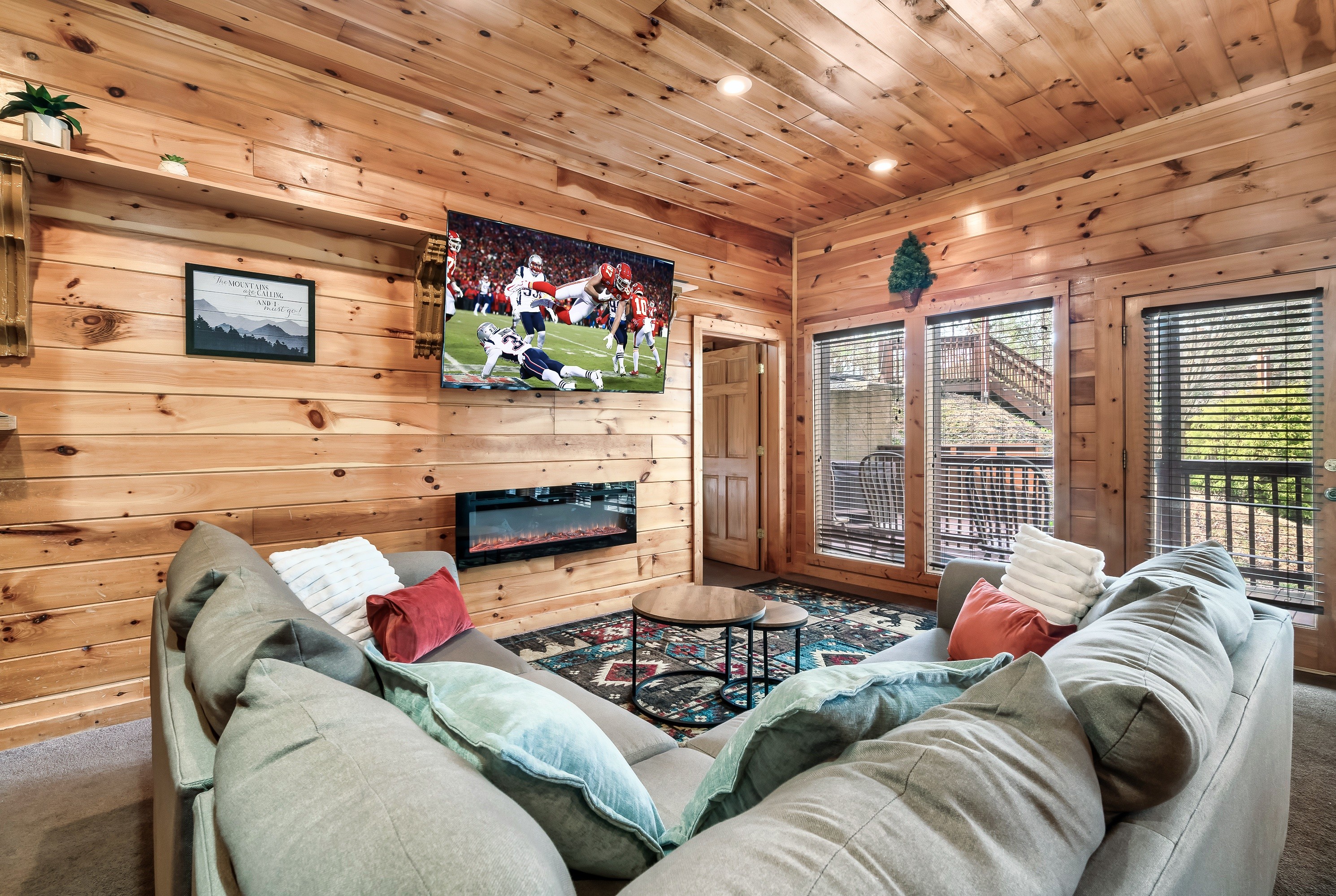 Living room with stone fireplace